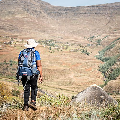 39-year-old VHW 'Makelello Moleko on her way to a patient visit in Shapa-Ngoetsi, Butha-Buthe district, Lesotho, on May 19, 2025.